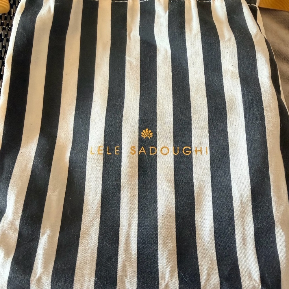 Lele Sadoughi Black and White Striped Drawstring Pouch with Gold Logo - Picture 4 of 5